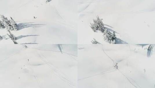 在雪山上滑雪的滑雪者高清在线视频素材下载