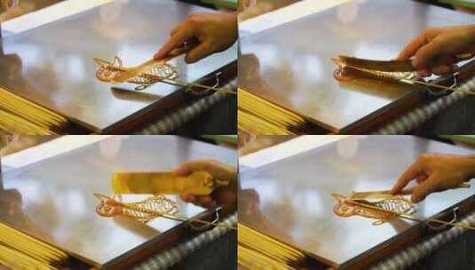 南京夫子庙老门东传统手工糖画，画兔子图案高清在线视频素材下载