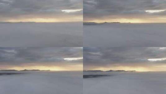 航拍穿过云雾迎接朝霞高清在线视频素材下载