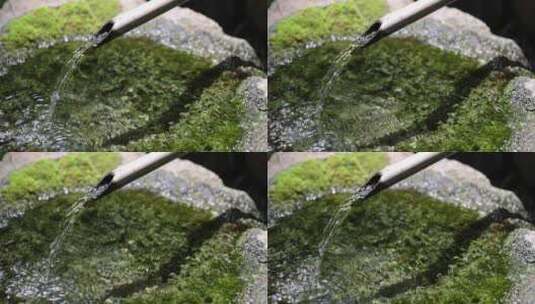 禅宗花园中的竹制喷水池高清在线视频素材下载