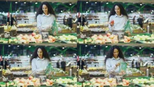 年轻漂亮的黑发女人在杂货店超市的货架上选高清在线视频素材下载