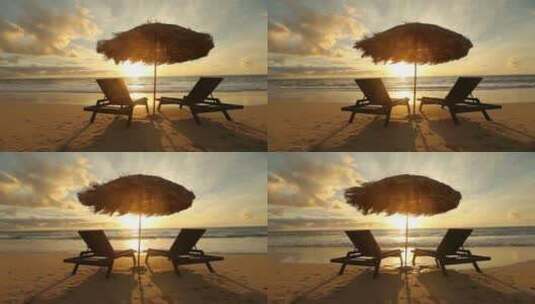 日落时海边的沙滩椅和太阳伞高清在线视频素材下载