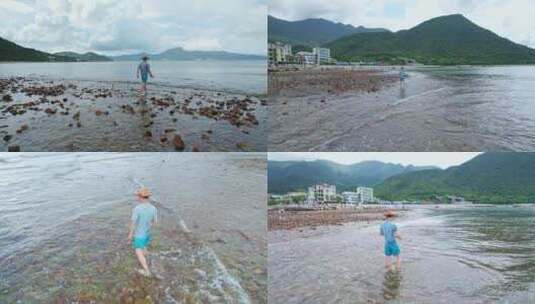 男子海边旅行无人机智能自动飞行航拍高清在线视频素材下载