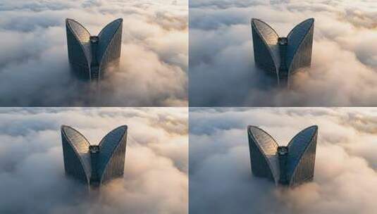 航拍城市摩天大楼云海日出震撼地标视频高清在线视频素材下载