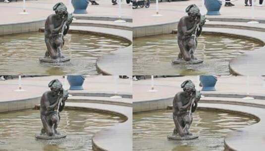 公园购物中心广场喷水池中的雕塑高清在线视频素材下载