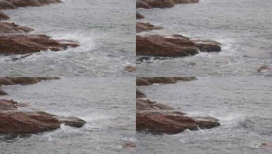 深圳海岸线-大梅沙礁石风起浪涌高清在线视频素材下载