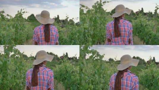 美丽微笑的女孩（女人）农民戴着草帽，穿着高清在线视频素材下载