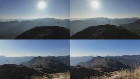 晴天在山顶上俯视山区丘陵美景高清在线视频素材下载