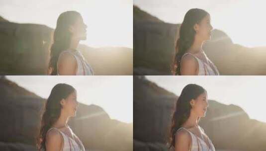 女人，呼吸和思考户外和平的未来，在日落时高清在线视频素材下载
