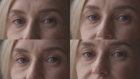 一个蓝眼睛金发女人的特写肖像高清在线视频素材下载