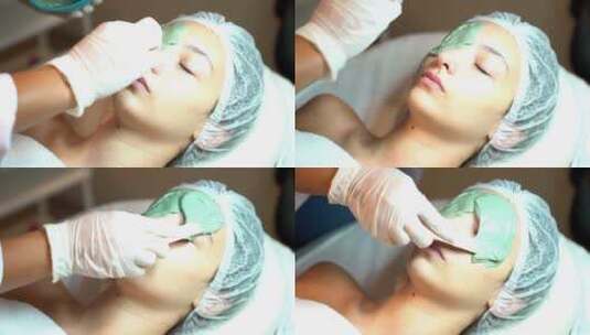 美容师为女士涂抹面膜高清在线视频素材下载