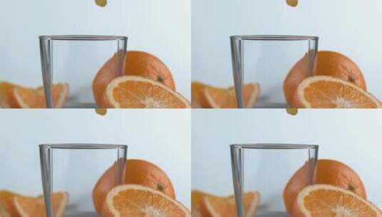 橙汁倒入玻璃杯慢动作镜头高清在线视频素材下载