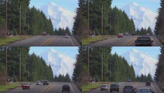 汽车通过雪山下的高速公路高清在线视频素材下载