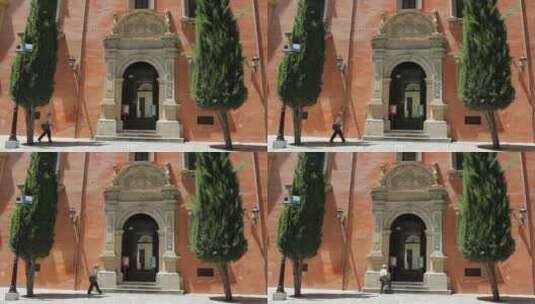 一个男人走进格拉纳达大教堂的门高清在线视频素材下载