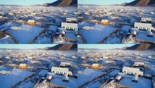航拍大兴安岭林区冬季寂静雪村民居高清在线视频素材下载