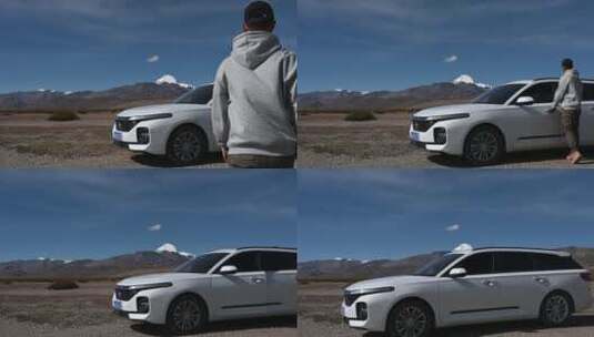 在西藏冈仁波齐山下拍摄的汽车驶过的空镜高清在线视频素材下载