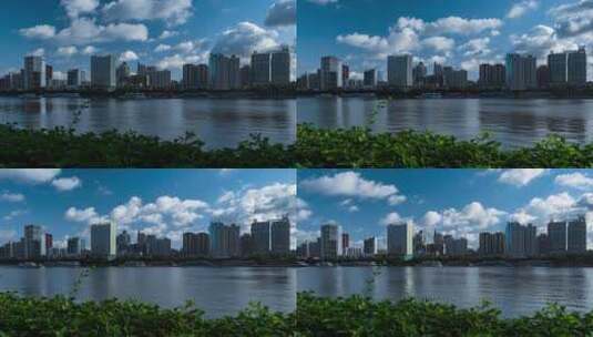 中国珠江岸摩天大楼与蓝天白云延时风光高清在线视频素材下载