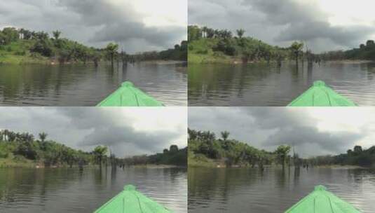独木舟穿过亚马逊河天际线景观高清在线视频素材下载
