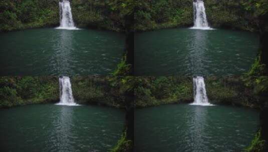 航拍森林中的瀑布高清在线视频素材下载