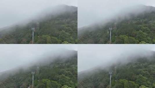 雨后森林缆车航拍雾天山林观光索道高清在线视频素材下载