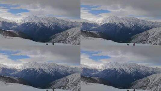 四川甘孜子梅垭口风雪中贡嘎山群峰高清在线视频素材下载