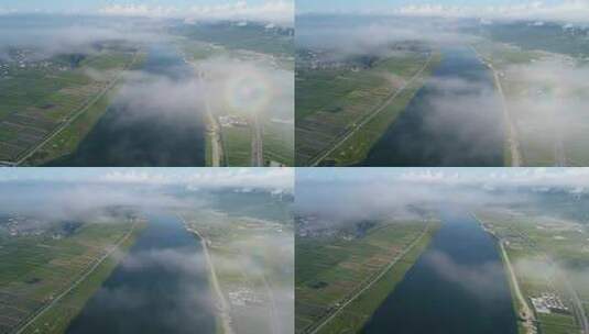 云海之下的梅山湾河道4k航拍视频高清在线视频素材下载