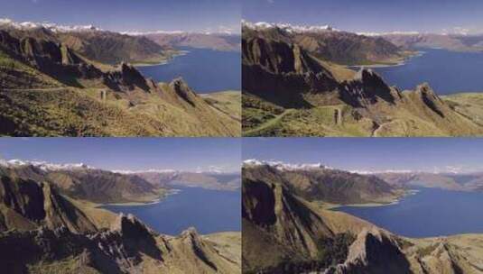 航拍湖泊旁的山脉高清在线视频素材下载