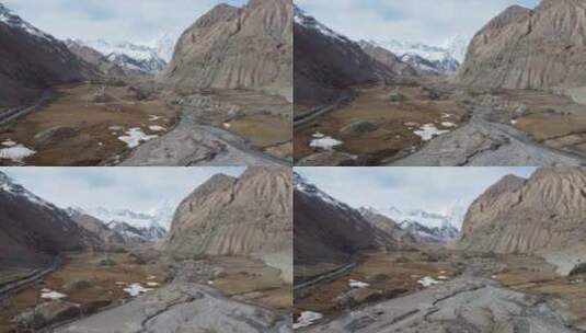 航拍新疆南疆帕米尔高原大气雪山公路景色高清在线视频素材下载