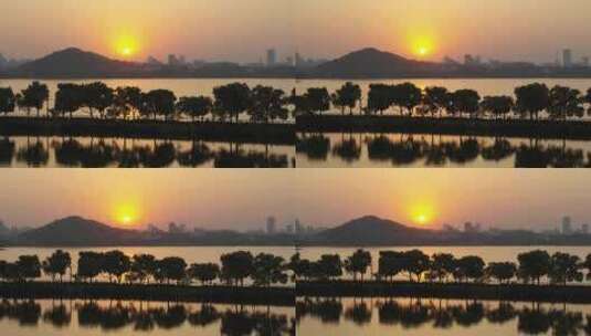 航拍武汉东湖绿道夕阳剪影高清在线视频素材下载