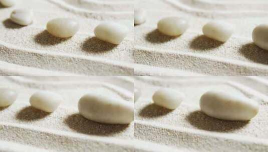 沙子上鹅卵石高清在线视频素材下载