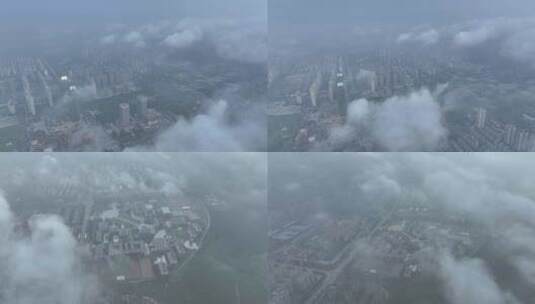 航拍枣庄五百米高空的云雾笼罩城市上空高清在线视频素材下载