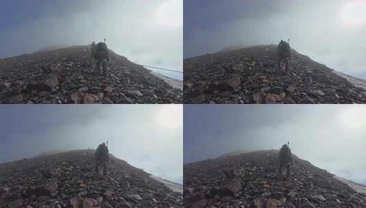 攀登四川岷山山脉雪宝顶的登山者高清在线视频素材下载