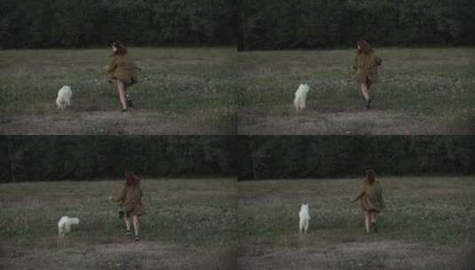 女人和狗奔跑高清在线视频素材下载