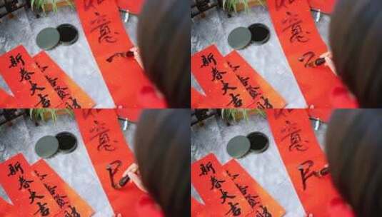 中国农历新年写春联的女性高清在线视频素材下载