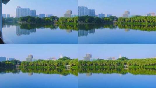 广州流花湖公园城市建筑与绿树湖景自然风光高清在线视频素材下载
