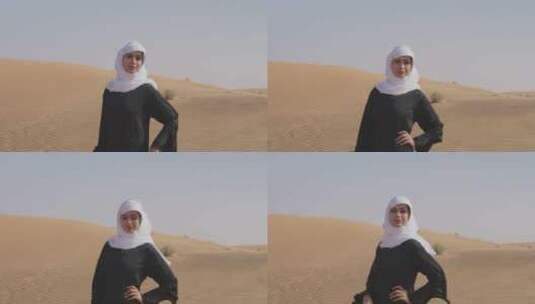 女人在沙漠中摆姿势高清在线视频素材下载