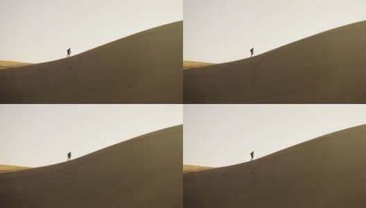 沙漠中徒步的人高清在线视频素材下载
