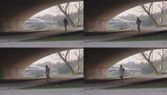 在桥下奔跑的男人高清在线视频素材下载