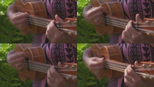 当地妇女演奏双弦尤克里里的特写镜头高清在线视频素材下载