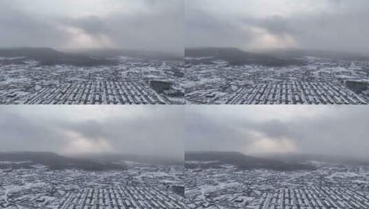 航拍大兴安岭山村降雪高清在线视频素材下载