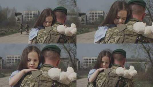 士兵抱着一个女孩高清在线视频素材下载