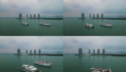 航行在凤凰岛周边的大型旅游客轮高清在线视频素材下载