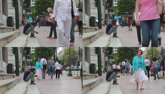 希腊，雅典，2013年6月7日：希腊雅典街头的乞丐和人们高清在线视频素材下载