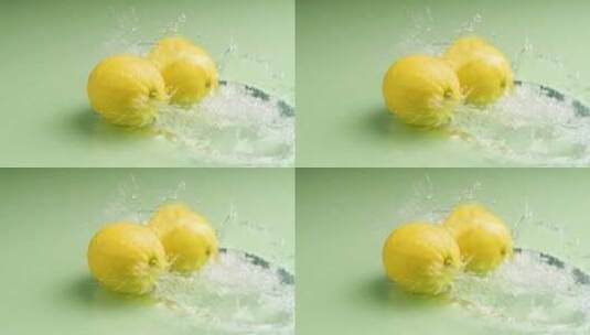 慢动作水花中的柠檬高清在线视频素材下载