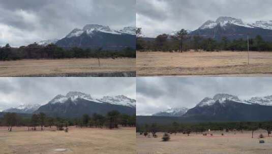 在车上看雪山远景高清在线视频素材下载