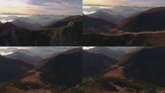 日落时分，无人机在云海下探索山脉。空中4高清在线视频素材下载