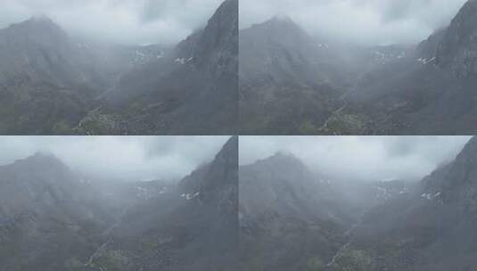 雨中航拍甘孜稻城亚丁山脉风景高清在线视频素材下载