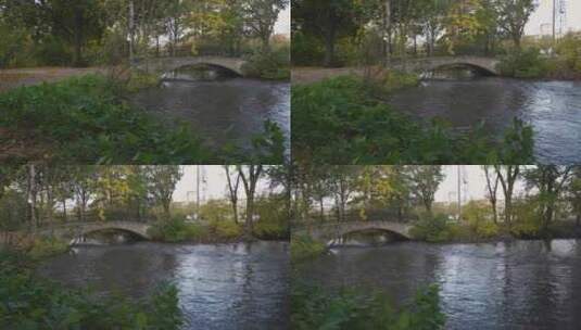 公园桥下流淌的小溪。高清在线视频素材下载