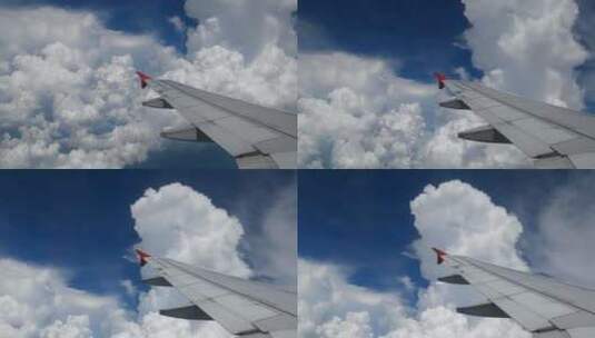 民航飞机窗外的云层天空高清在线视频素材下载