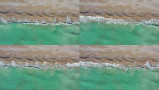 大浪涌向海岸沙滩高清在线视频素材下载